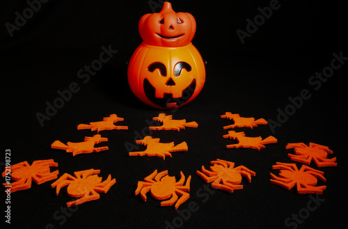 Halloween decorative elements arranged with creativity and festive spirit, symbolizing the fun, mystery and playful atmosphere of this traditional spooky celebration
