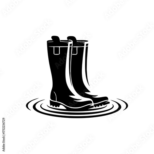 Pair of boots standing in a puddle, representing rainy weather and cozy outdoor moments.
