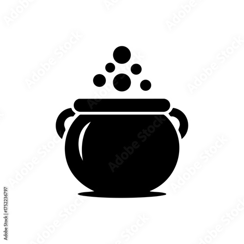 Bubbling cauldron symbolizing witchcraft, potion making, and magical Halloween traditions.
