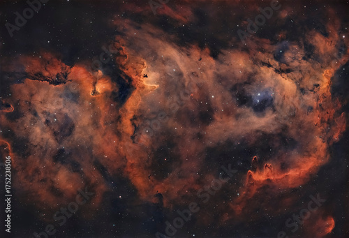 Ionized by the radiation from young, hot stars, the Soul Nebula contains glowing clouds of hydrogen, oxygen, and sulfur gases. It is located about 7,500 light years from Earth.