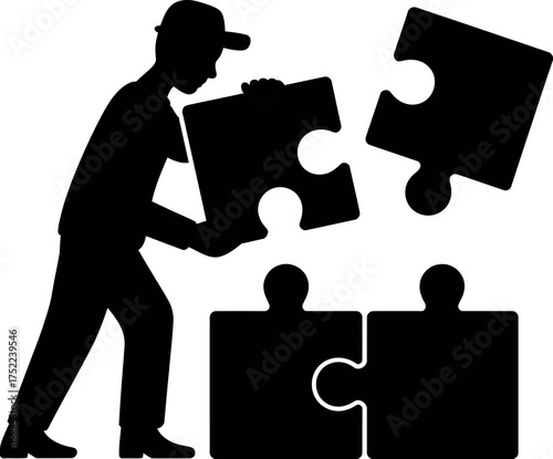 Silhouette of a person assembling puzzle pieces