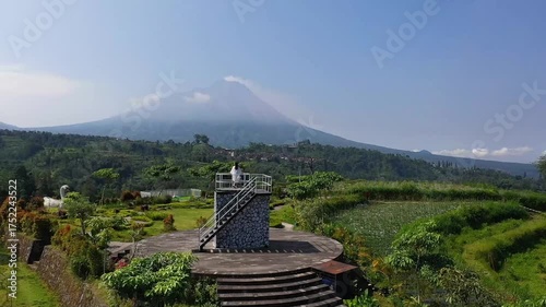 Stunning Mountain Vista with Lush Green Landscape and Clear Blue Sky.