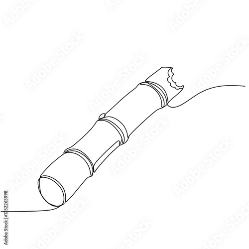 Single sugar cane stick with a bite mark on a white background  