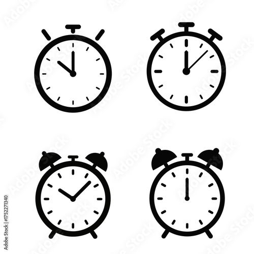 Four classic alarm clocks and stopwatches symbols representing time management and punctuality concepts isolated on white background