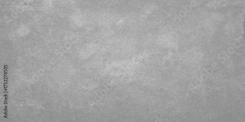 Dark grunge concrete wall texture with a rough gray surface backdrop