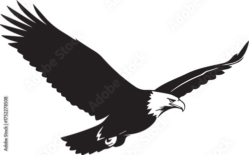 Majestic bald eagle soaring with wings spread wide in a powerful flight pose