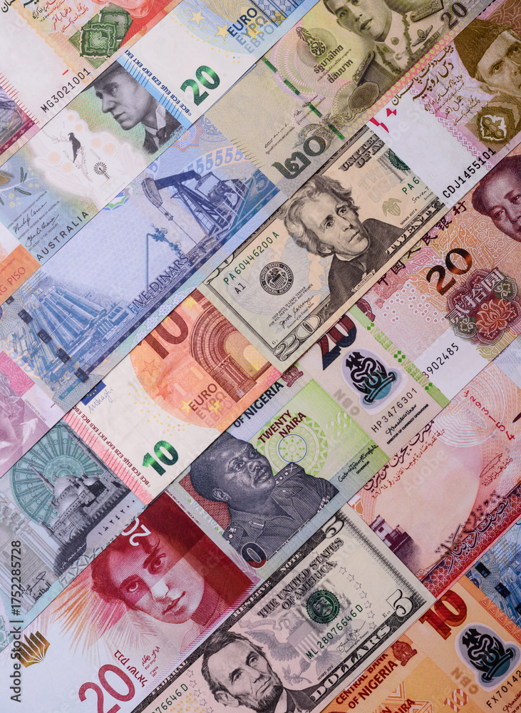 Obraz premium Paper money, banknotes of different countries as a business background. Paper money and cash