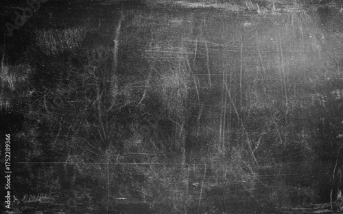 Black and white grunge. Distress overlay texture. Abstract surface dust and rough dirty wall background concept. Chalk rubbed out on blackboard background