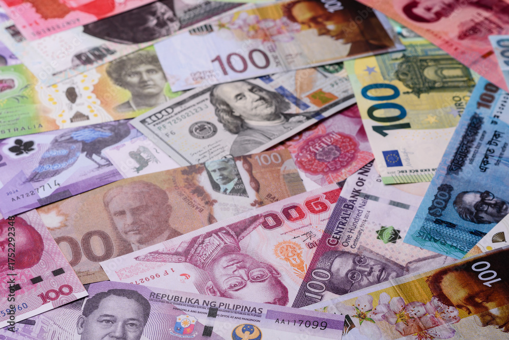 Obraz premium Paper money, banknotes of different countries as a business background. Paper money and cash