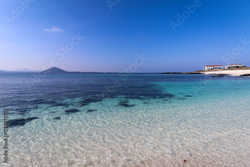 Scenic Coastal View of Seongsan Ilchulbong and the Beach in Jeju Island, South Korea