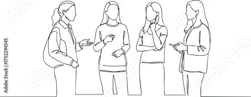 A group of women engaging in conversation and discussion in a casual setting.