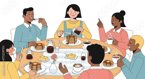 A diverse group of friends enjoying a pancake breakfast together around a table.