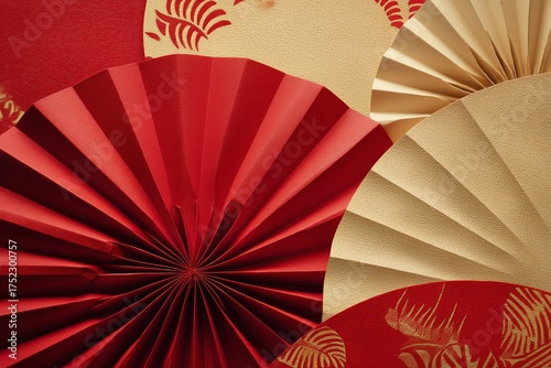 Colorful Paper Fans in Red and Gold Arranged for Decoration During a Celebration