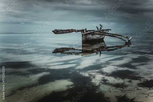An abandoned ship stands aground. A heavenly landscape. A wooden ship. Beautiful nature. Blue sky.