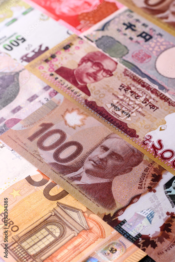 Obraz premium Paper money, banknotes of different countries as a business background. Paper money and cash