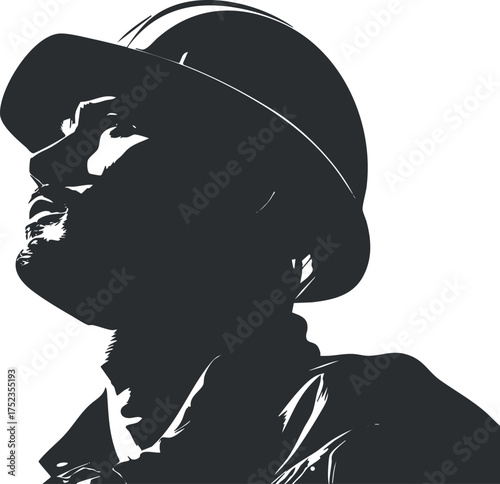 Monochrome silhouette of a man in a hat, showcasing a mysterious and stylish profile.