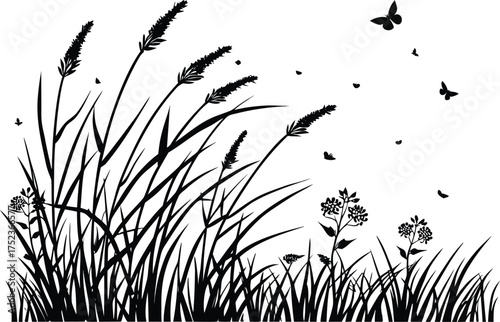 Black and white silhouette of tall grass and wildflowers with butterflies fluttering in the breeze