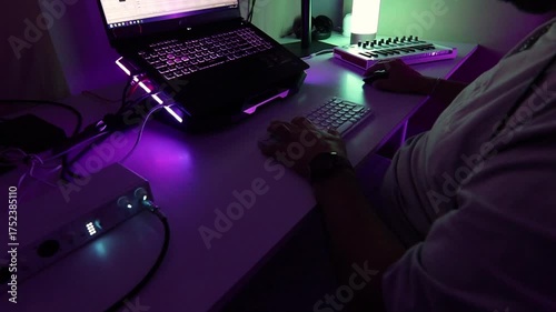 Music producer working on a pc