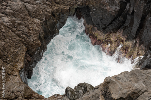 Natural Lava Rock Blowhole with Crashing Waves in Porto Moniz, Madeira, Portugal