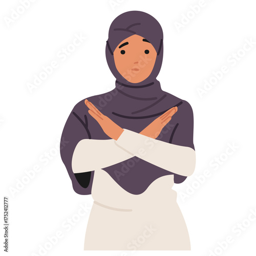 Confident Muslim woman in hijab crossing arms in stop gesture, expressing refusal and disagreement