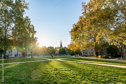 The sun setting on the campus of the University of Notre Dame on a bright sunny day