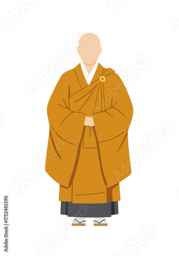 A Buddhist Monk in Traditional Robes Standing with Hands Clasped
