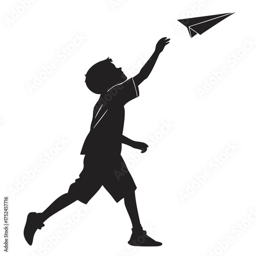 Boy throwing paper plane silhouette