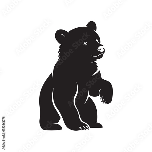 Minimalist black bear cub icon – stylized silhouette of standing bear with raised paw, rounded head, and visible claws for wildlife design, nature visuals, and playful-themed graphics.