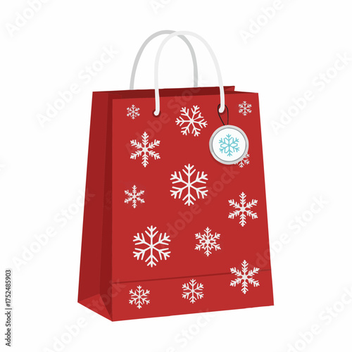 Festive red gift bag decorated with sparkling white snowflakes for christmas and winter holidays