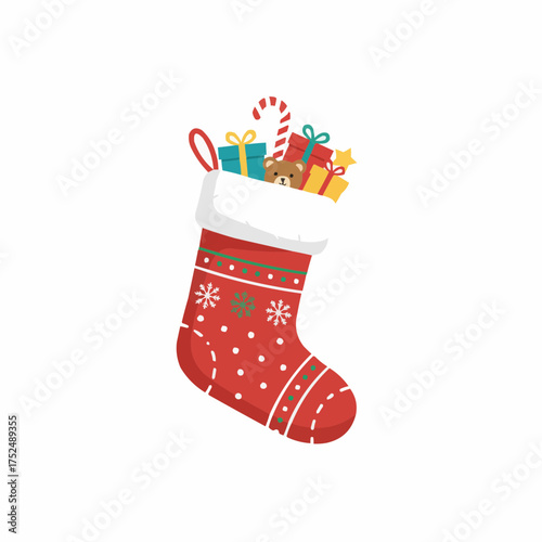 Festive red christmas stocking filled with gifts and a teddy bear