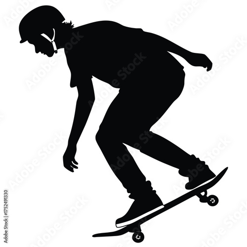 Skateboarder crouching grind silhouette