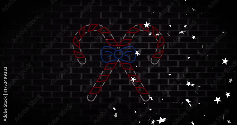 Fototapeta premium Neon candy canes with bow and stars image over dark brick wall