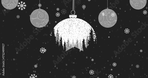 Snowflakes falling over christmas bauble decoration hanging against black background