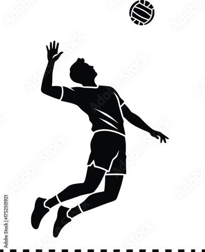 Silhouette of a volleyball player spiking the ball