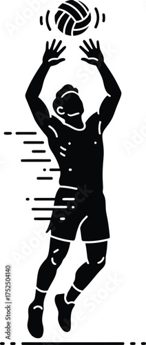 Silhouette of a volleyball player spiking the ball