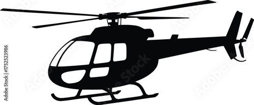 Black helicopter silhouette in flight aviation transport