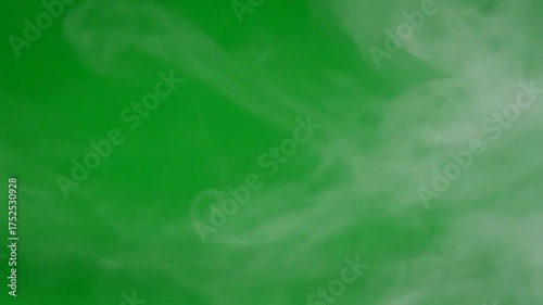 Ethereal White Smoke Swirls Against Vivid Green Screen Background Chroma Keyable Abstract Effect