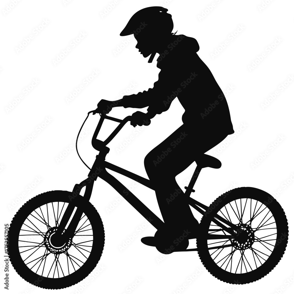 Fototapeta premium Teenager riding bike silhouette