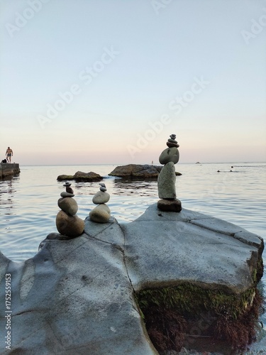 Wallpaper Mural pyramids of stones. stone pyramids on the seashore Torontodigital.ca
