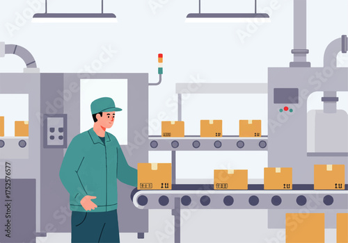 A worker in a cap and jacket places cardboard boxes onto a moving conveyor belt in a factory setting.