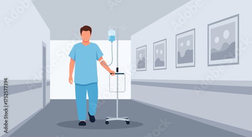 Man in scrubs walking with IV drip in hospital hallway.