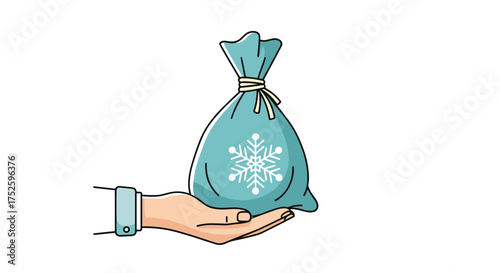 A hand holds a blue gift bag decorated with a snowflake suggesting a winter holiday present.