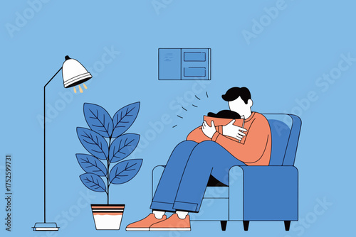 Man Relaxing in Armchair with Book