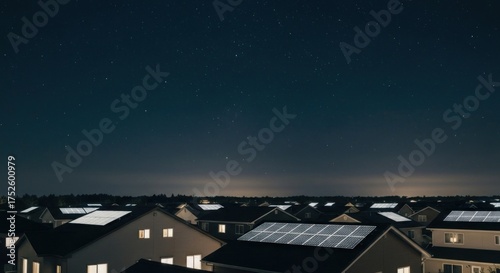 Solar panels on rooftops at night with starry sky above