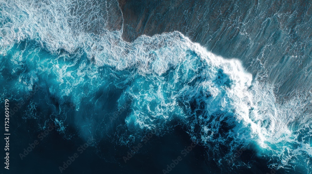 Obraz premium The sea water is very clear, abstract aerial view background of blue waves