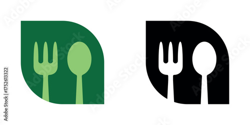 Fork and spoon on a leaf silhouette. Healthy food concept logo vector illustration design. Black and green..