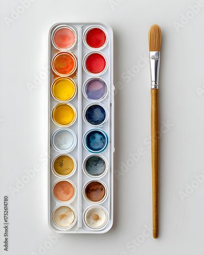 Watercolor Paint Palette with Brush on White Background