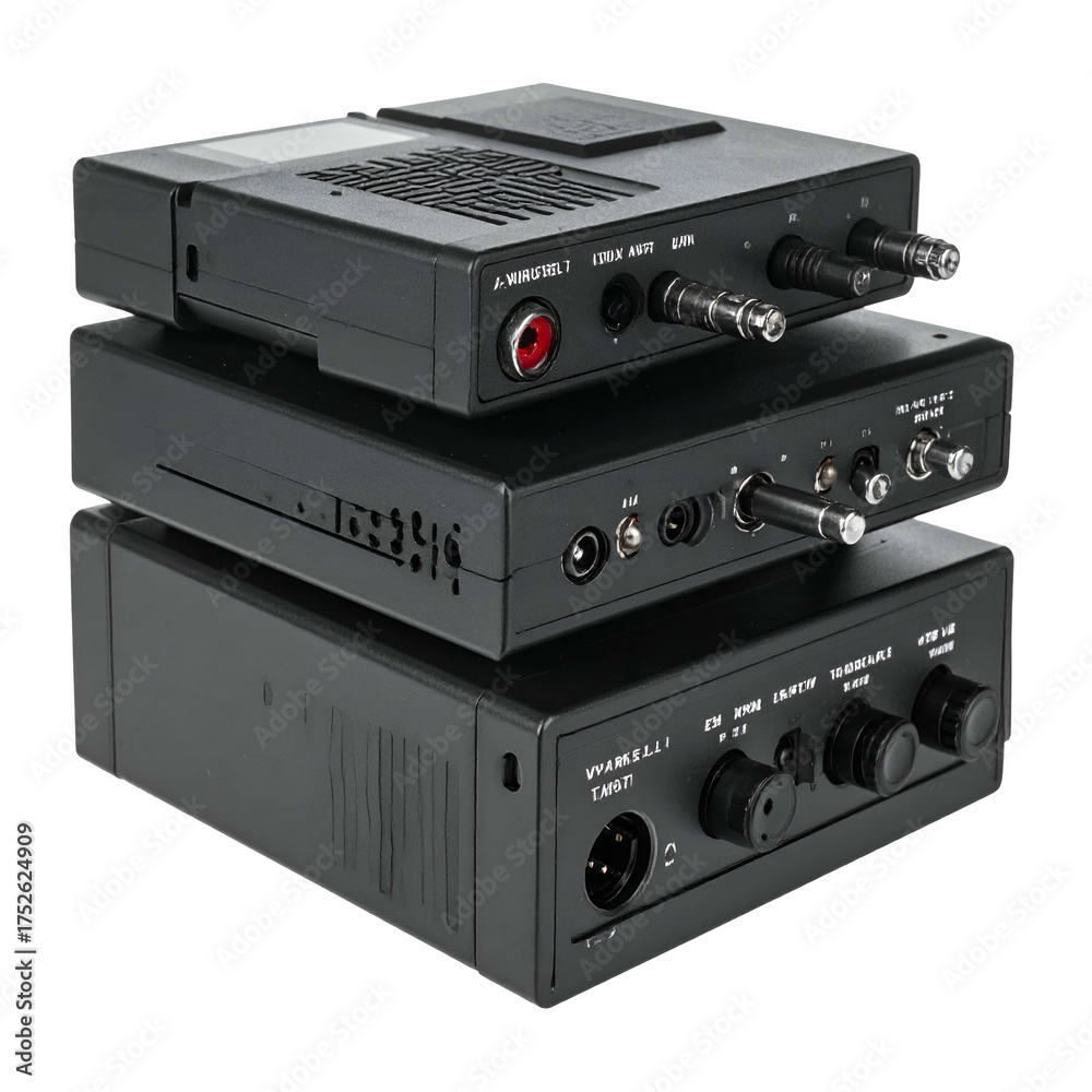 Obraz premium Black electronic audio equipment devices stacked together.