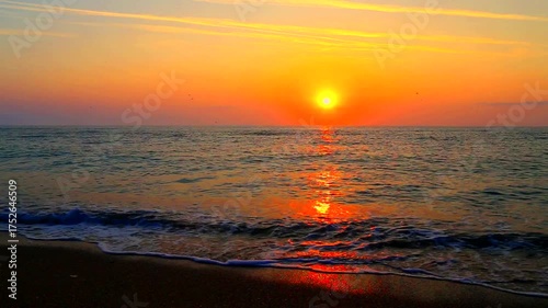 Beautiful summer sunrise over the beach