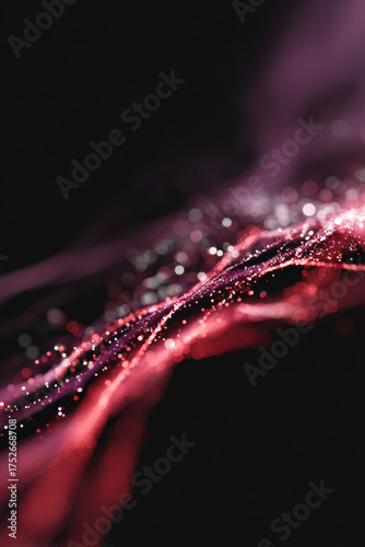 Abstract wallpaper with flowing red and purple light particles